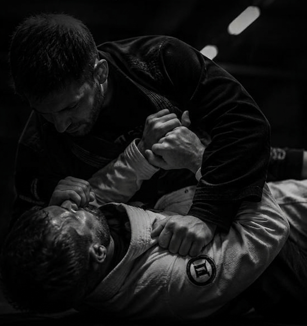 Jiu Jitsu practitioners grappling
